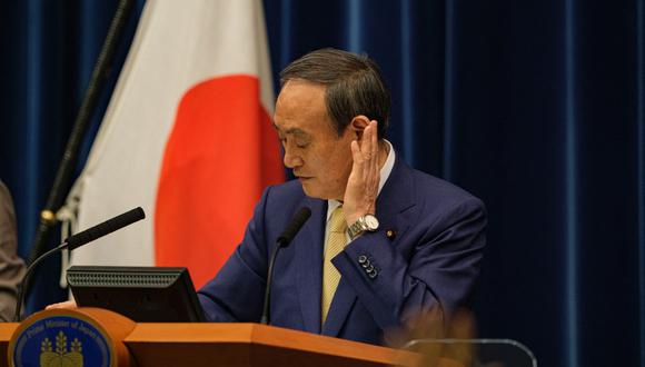 El apoyo de los votantes a Yoshihide Suga cayó 9 puntos porcentuales hasta el 34%, su nivel más bajo desde que asumió el cargo en septiembre, según una encuesta del diario económico Nikkei. (Foto: Nicolas Datiche / AFP)