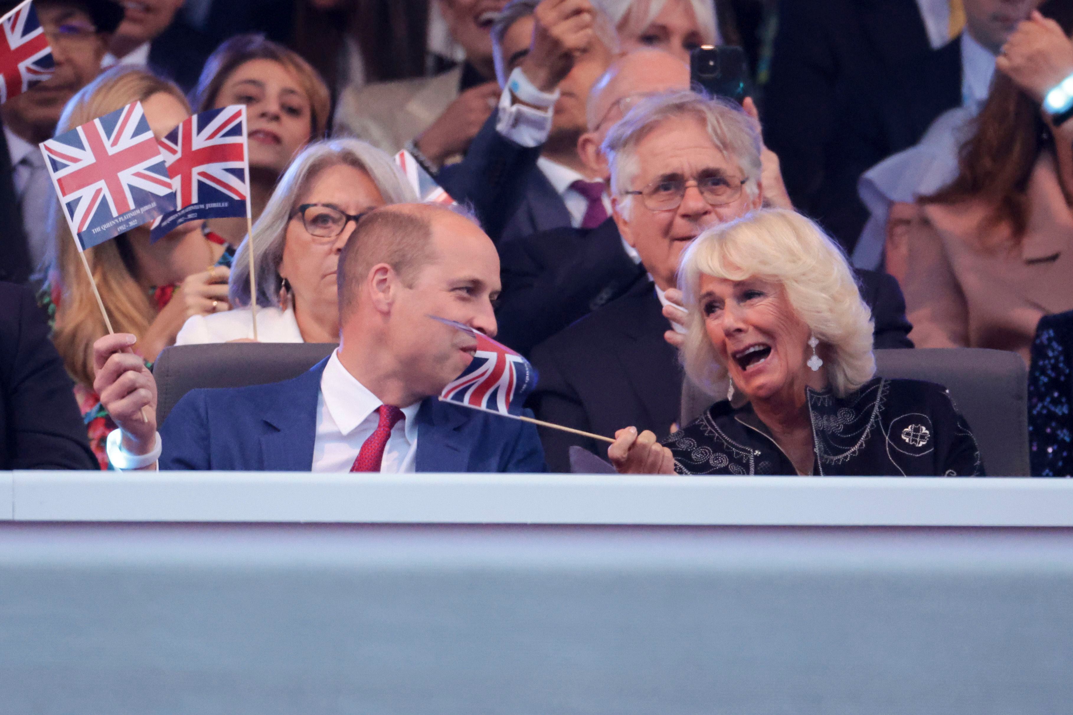 Prince William and Camilla, Duchess of Cornwall watch the Platinum Jubilee concert taking place outside Buckingham Palace, London on the third of four days of celebrations to mark the Platinum Jubilee.