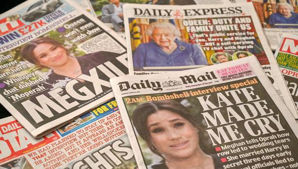 Diarios del Reino Unido con sus portadas sobre la entrevista concedida por Meghan Markle, duquesa de Sussex, esposa del príncipe Harry, duque de Sussex, a Oprah Winfrey. (Foto de Glyn KIRK / AFP).