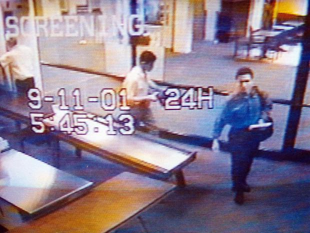 This video image shows terrorists Mohammed Atta (right) and Abdulaziz Alomari as they pass through the security of the Portland airport on September 11, 2001. (AFP).