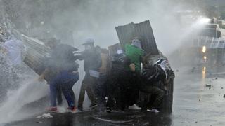 Venezuela: murió un policía durante las protestas en Valencia