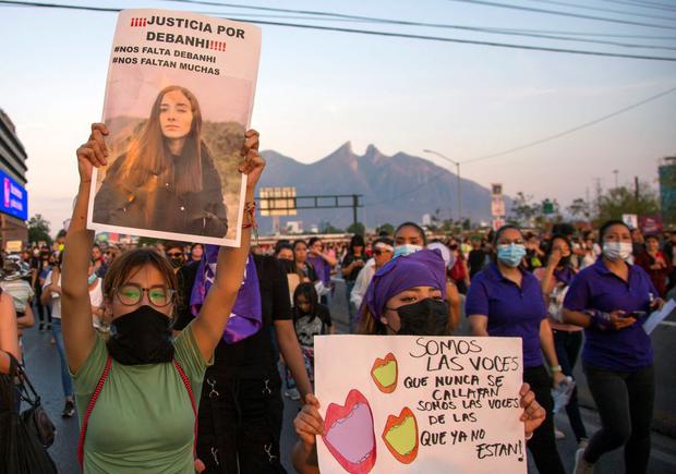 This file photo, taken on April 22, 2022, shows signs of women marching to demand justice for Debenhi Escobar.  (JULIO CESAR AGUILAR / AFP).