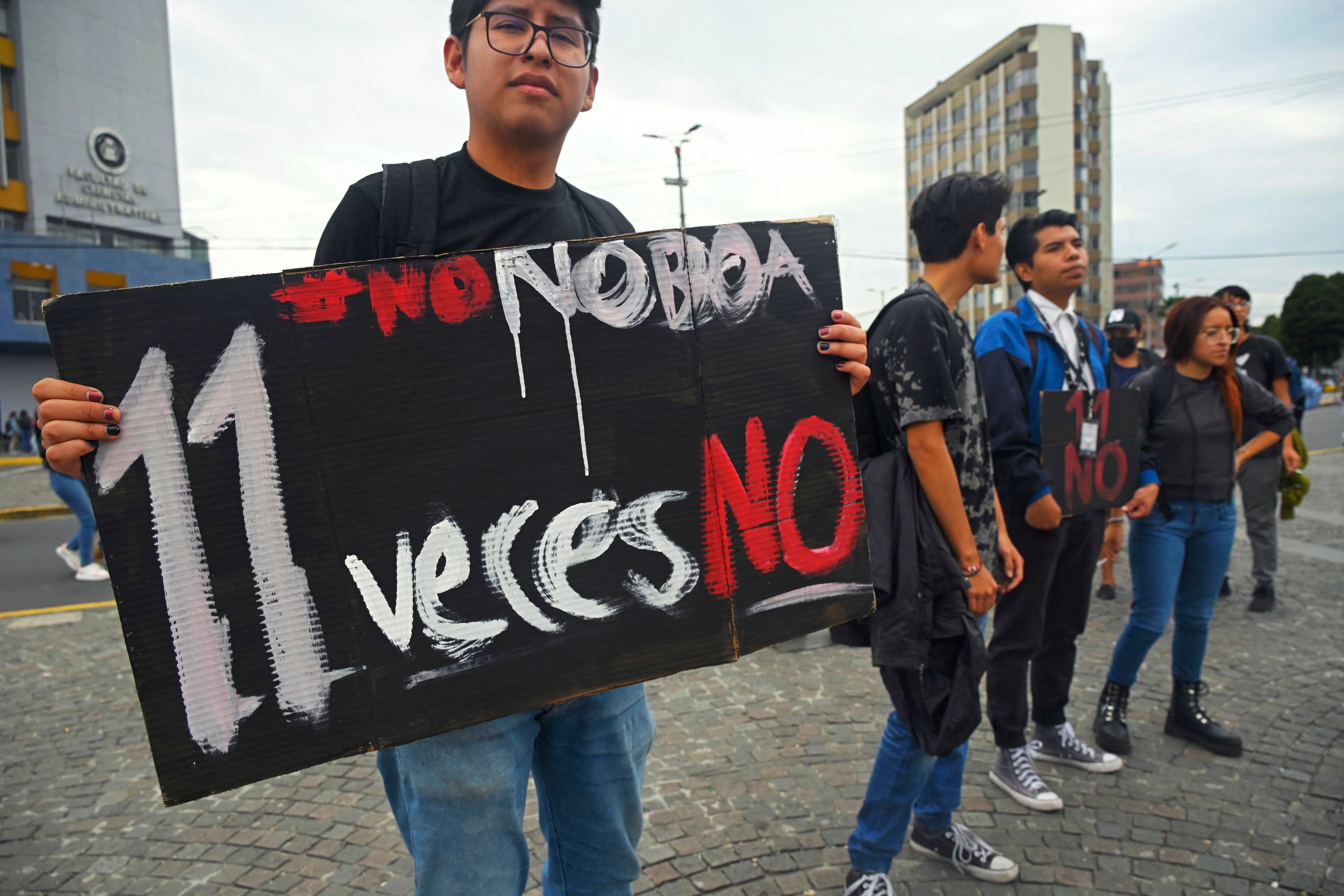 University students participate in a demonstration against the government of Ecuadorian President Daniel Noboa and the referendum.  (Photo by Rodrigo BUENDIA/AFP).