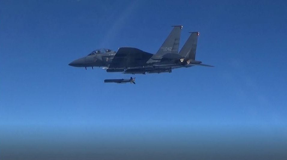 A South Korean Air Force F15 aircraft fires a surface-to-air missile toward the sea border with North Korea, in response to North Korean missile fire.  YONHAP via REUTERS