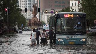 [FOTOS] Mortales inundaciones desplazan a más de medio millón de chinos