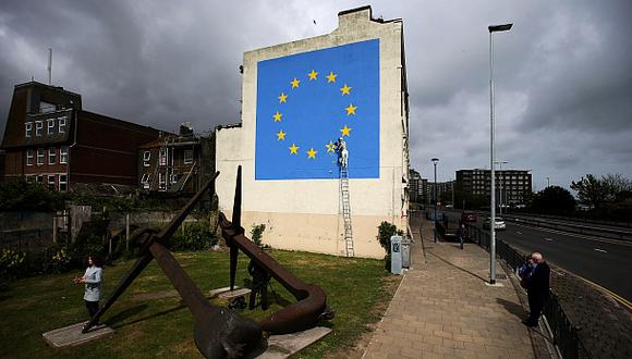 El mural de Banksy se puede ver en la fachada del edificio &quot;Castle Amusements&quot; de Dover. (Foto: AFP)