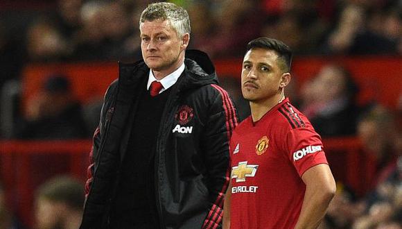 Alexis Sánchez y el entrenador del Manchester United. (Foto: AFP)