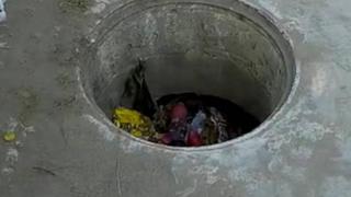 Mujer embarazada cayó en una alcantarilla destapada en Barranquilla 