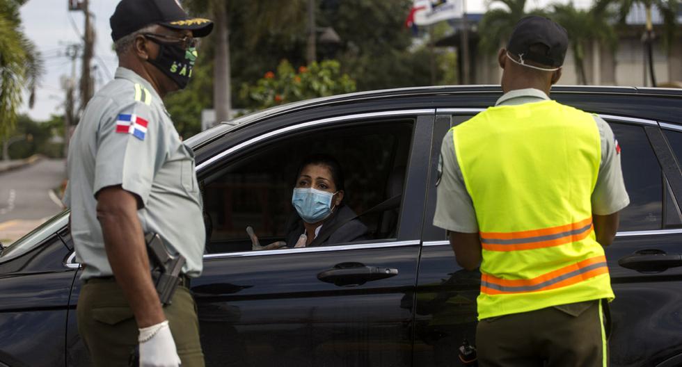 Coronavirus: El Gobierno dominicano impuso este lunes un régimen de sanciones para castigar a las personas que no usen mascarilla en lugares públicos. (Foto: AFP/Erika Santelices).