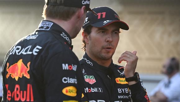 Red Bull Racing's Dutch driver Max Verstappen and Red Bull Racing's Mexican driver Sergio Perez talk after the qualifying session for the Formula One Azerbaijan Grand Prix at the Baku City Circuit in Baku on April 28, 2023. (Photo by NATALIA KOLESNIKOVA / AFP)