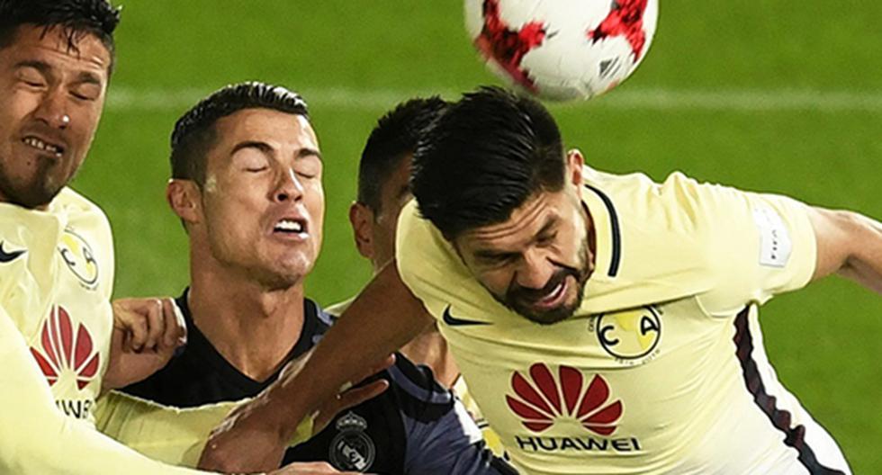 En la previa del partido Real Madrid vs América por el Mundial de Clubes, los goleadores Cristiano Ronaldo y Oribe Peralta protagonizaron un peculiar cruce de miradas. (Foto: EFE)