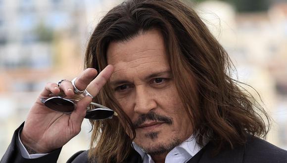 Johnny Depp habría cancelado un concierto en Budapest por culpa de una noche de fiesta. (Foto: Valery HACHE / AFP)
