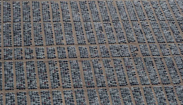 Reacquired Volkswagen and Audi diesel cars sit in a desert graveyard near Victorville, California, U.S. March 28, 2018. Volkswagen AG has paid more than $7.4 billion to buy back about 350,000 vehicles, the automaker said in a recent court filing, and is now storing thousands of vehicles around the United States. Picture taken March 28, 2018.  REUTERS/Lucy Nicholson