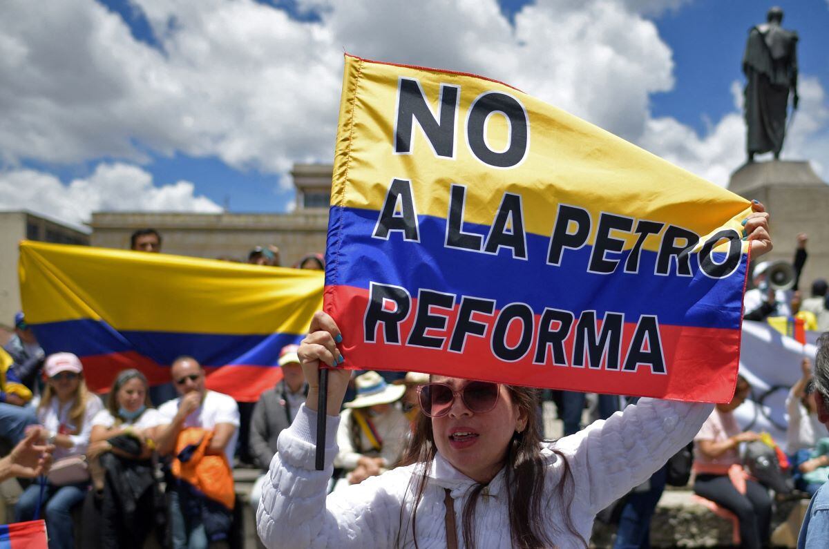 People demonstrate in Bogotá against a tax reform proposed by the government of Colombian President Gustavo Petro.