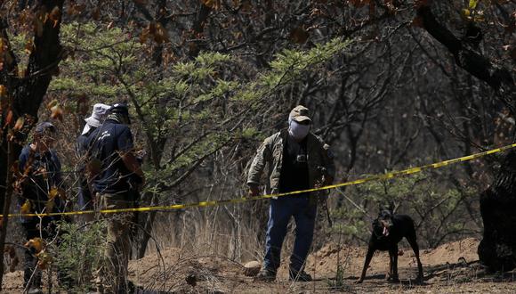 Investigadores policiales mexicanos. (Foto por ULISES RUIZ / AFP)
