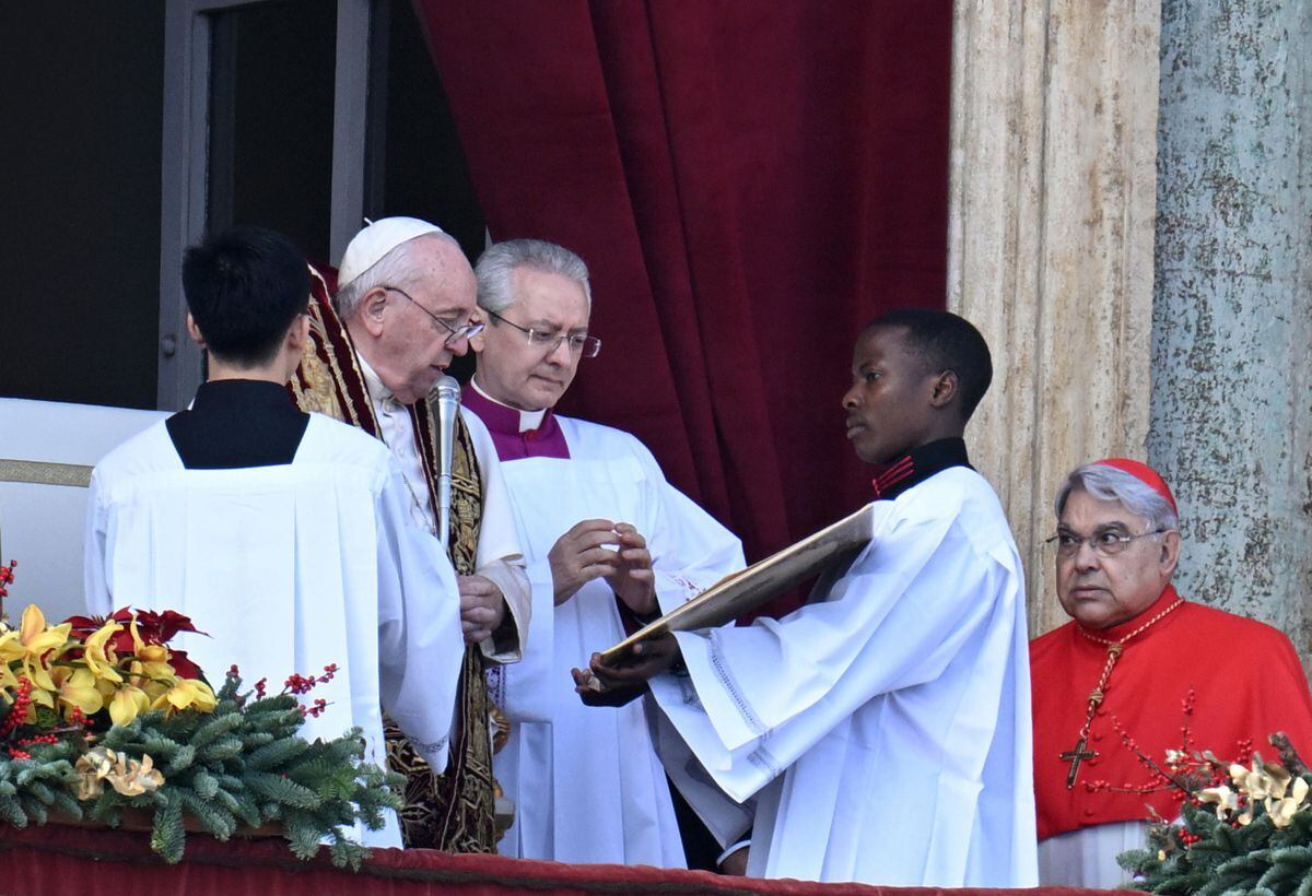 Pope Francis directs the Urbi et Orbi prayer from the balcony of the façade of Saint Peter's Basilica in the Vatican on the occasion of the Christmas holidays, on December 25, 2022. (Photo by EFE/EPA/ANSA/CLAUDIO PERI)