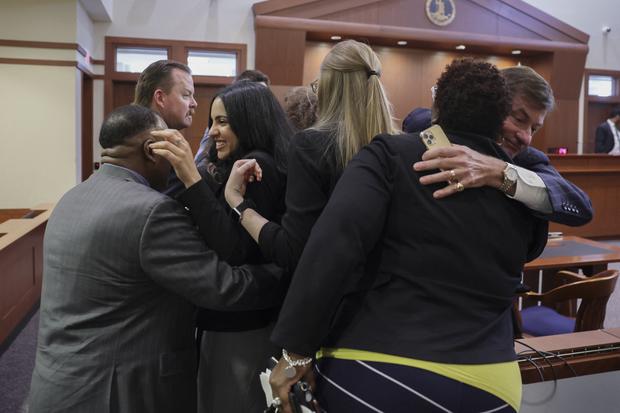 Johnny Depp hugs a member of the legal team after the verdict (Photo: EVELYN HOCKSTEIN / POOL / AFP)