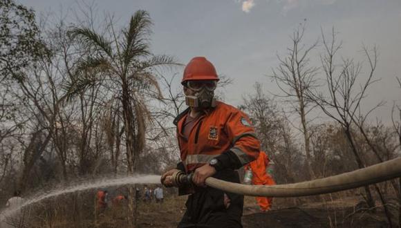 "Ya no tenemos hombres, no alcanzan los voluntarios", declaró la esposa de uno de los voluntarios. Foto: MARCELO PÉREZ DEL CARPIO, vía BBC Mundo