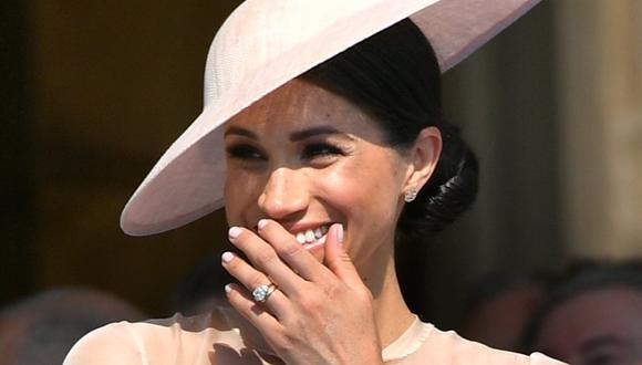 El príncipe Harry y su esposa Meghan Markle acudieron a una fiesta en los jardines del palacio de Buckingham para celebrar el 70 cumpleaños del padre de Harry, el príncipe Carlos, heredero al trono de Isabel II. (AFP).