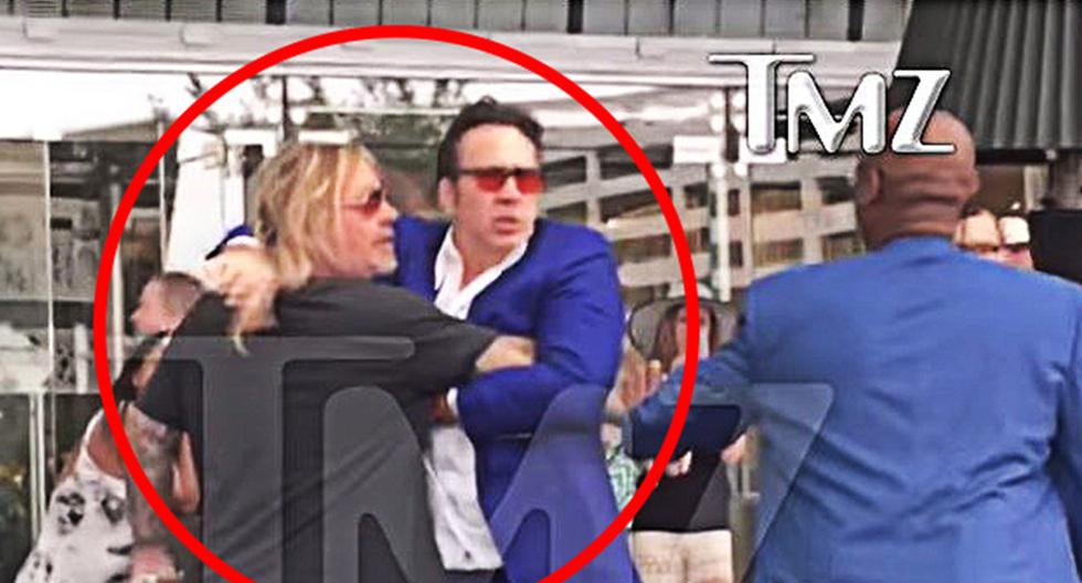 Nicolas Cage y Vince Neil fueron captados forcejeando por una mujer. (Foto: Captura TMZ)