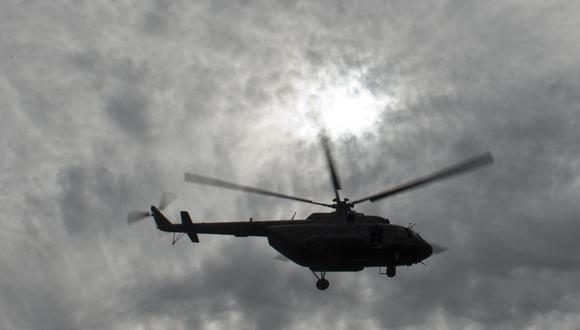 Un helicóptero MI-17 de fabricación rusa del ejército de Colombia despega de una base militar, el 26 de septiembre de 2014, en Buga, Colombia. (Foto de LUIS ROBAYO / AFP)
