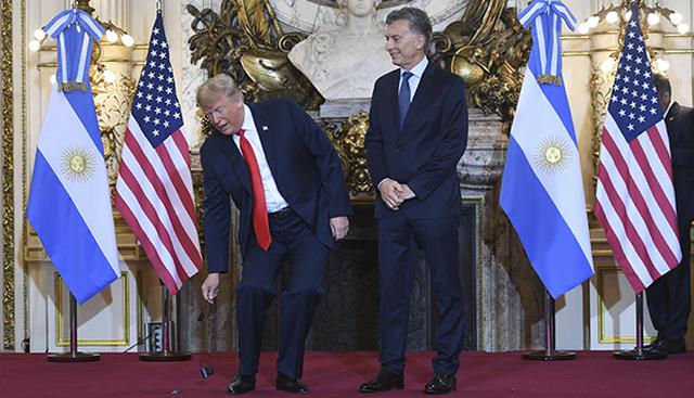 G20: Trump se queja de la traducción y tira su audífono al suelo. Foto: AFP