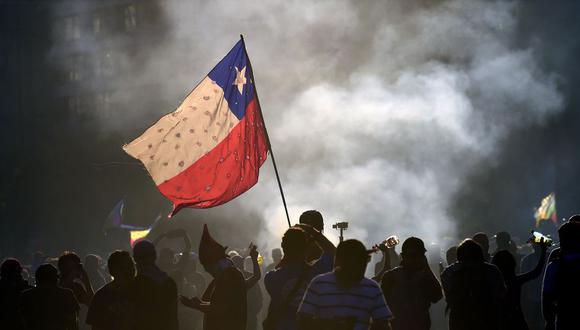 Este es el precio del billete verde en Chile. (Foto: AFP)