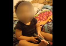 EE.UU: Padres filman a bebé metiéndose un arma en la boca (VIDEO)