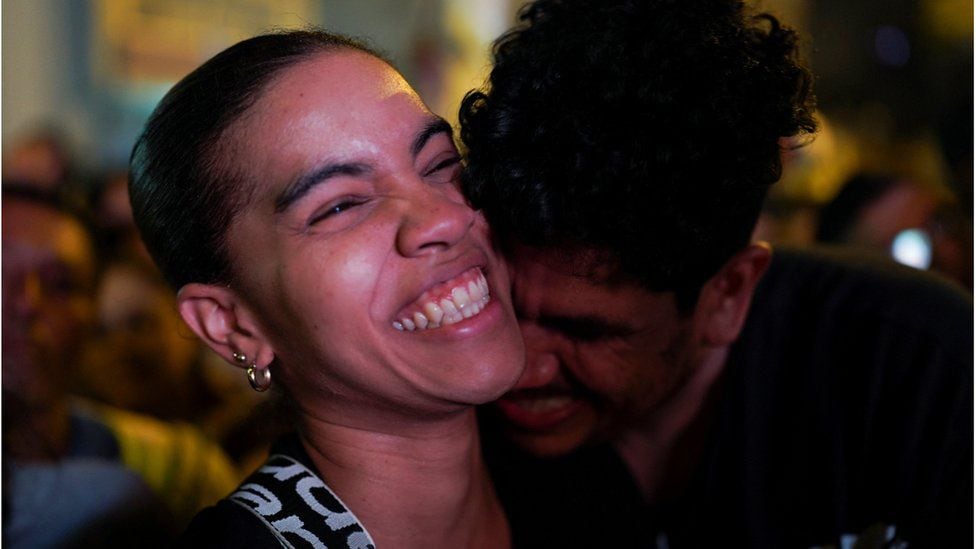 A woman and a man celebrate Petro's triumph.  (REUTERS).