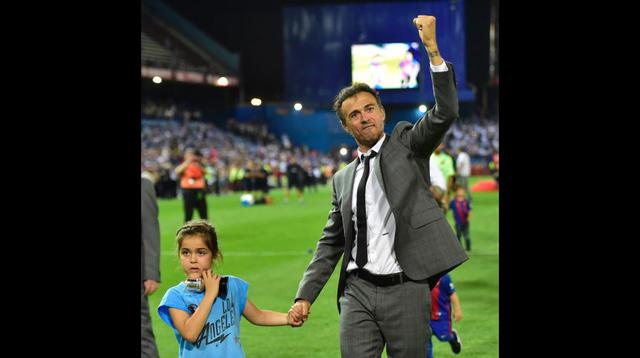 Luis Enrique celebrando junto a su hija. (Foto: AFP)