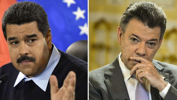 Nicolás Maduro, presidente de Venezuela, y su par de Colombia Juan Manuel Santos. (AFP):