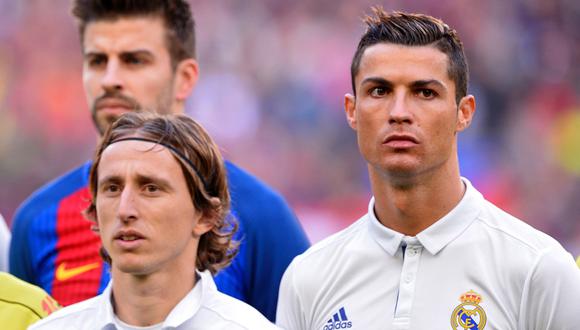 Luka Modric y Cristiano Ronaldo fueron compañeros en Real Madrid. (Foto: AFP)