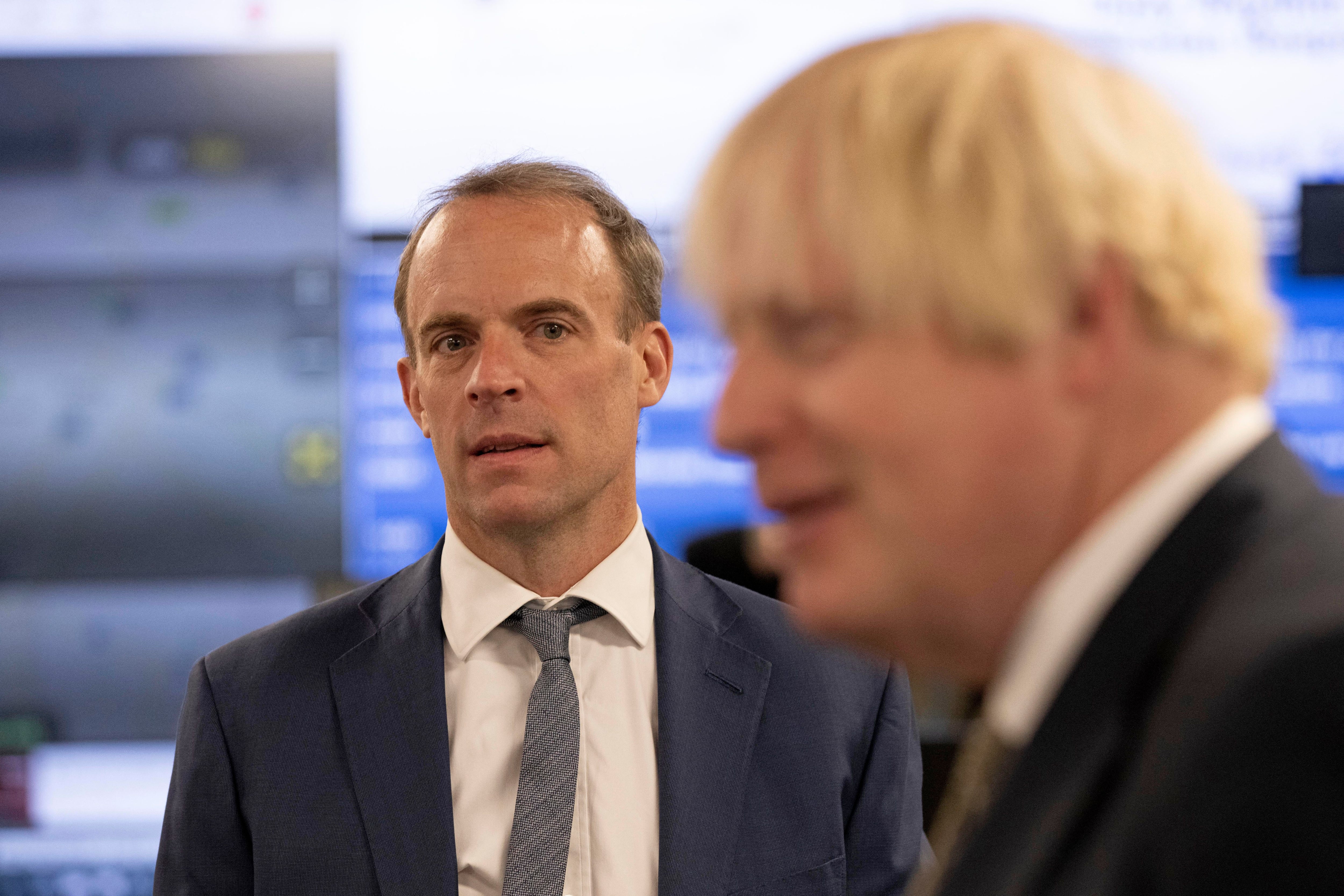 Raab with Boris Johnson.  (Photo: AFP)