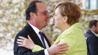 Hollande y Merkel se despiden celebrando su amistad
