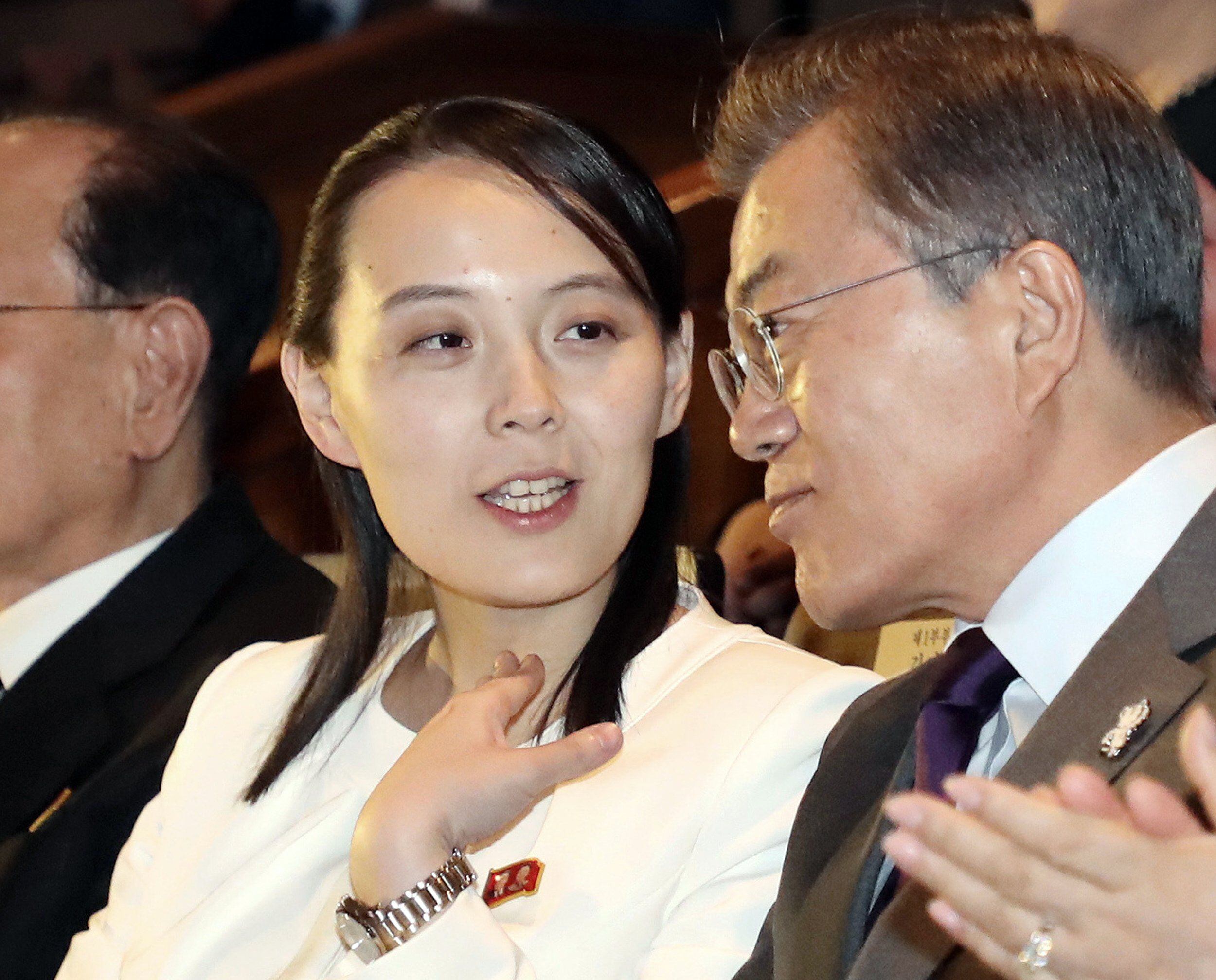 Kim Yo Jong chats with South Korean President Moon Jae-in as they watch a performance by North Korea's Samjiyon Orchestra at the National Theater in Seoul on February 11, 2018. (AP Photo)