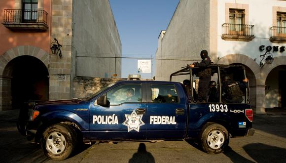 La Policía Federal patrulla las calles de Morelia, Michoacán, México, el 13 de noviembre de 2011. (AFP PHOTO / Alfredo ESTRELLA).