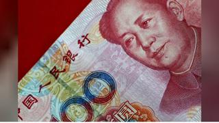China busca calmar a mercados tras caída de acciones y del yuan