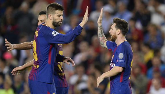 Piqué y Messi en el Barcelona. (Foto: AFP)