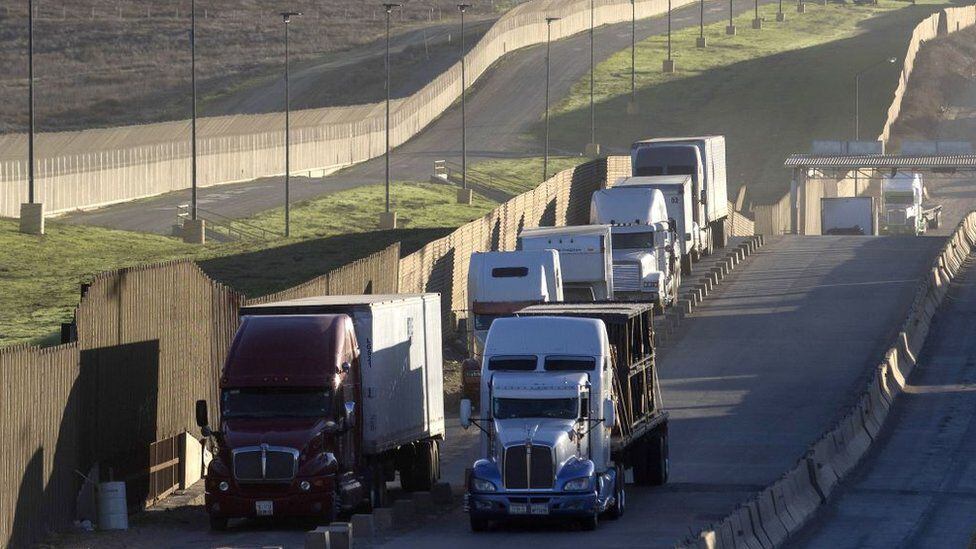 Trailers circulate on the US-Mexico border