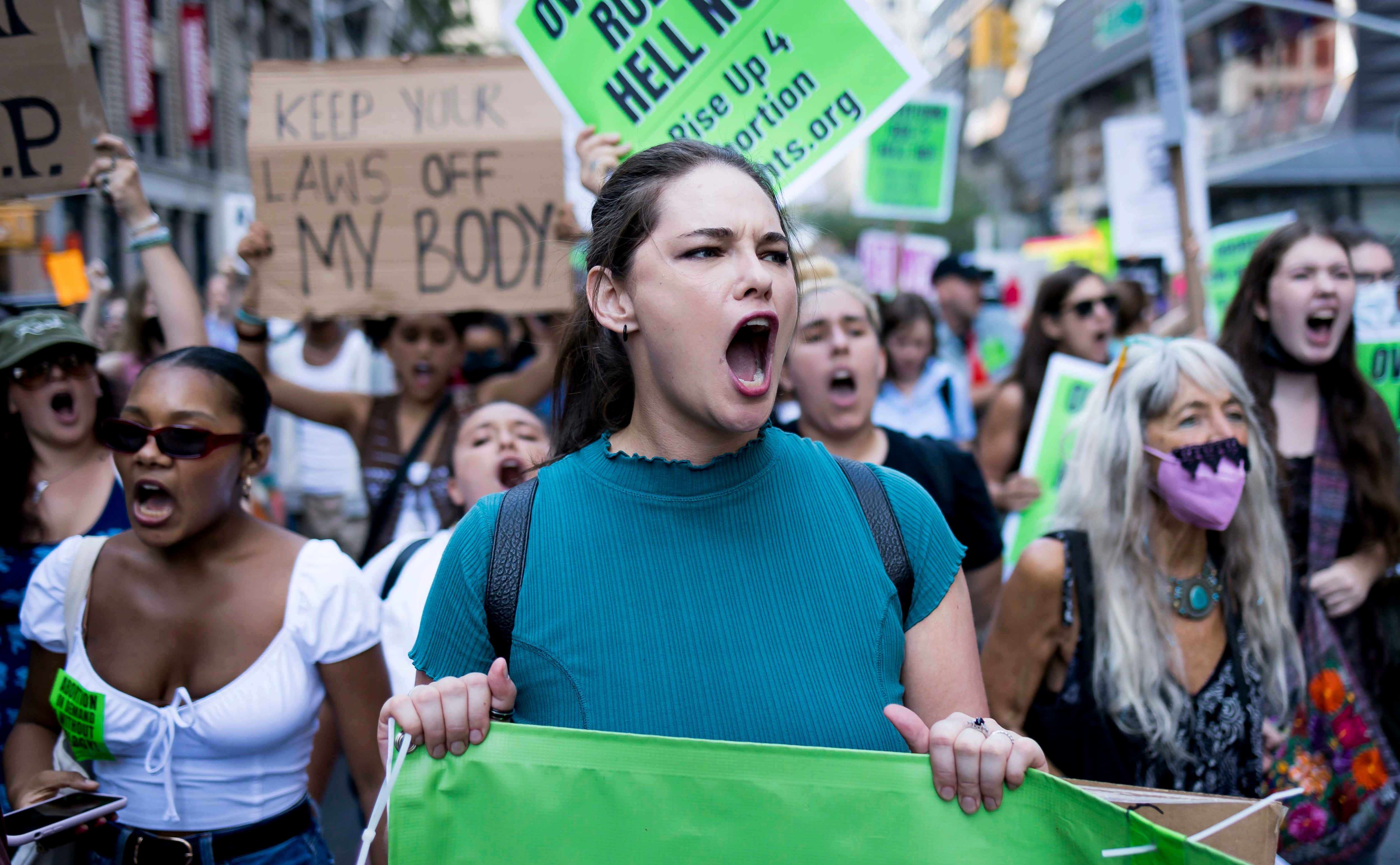 People march during an abortion rights protest in reaction to today's US Supreme Court decision in Dobbs v Jackson Women's Health Organization in New York, New York, USA.