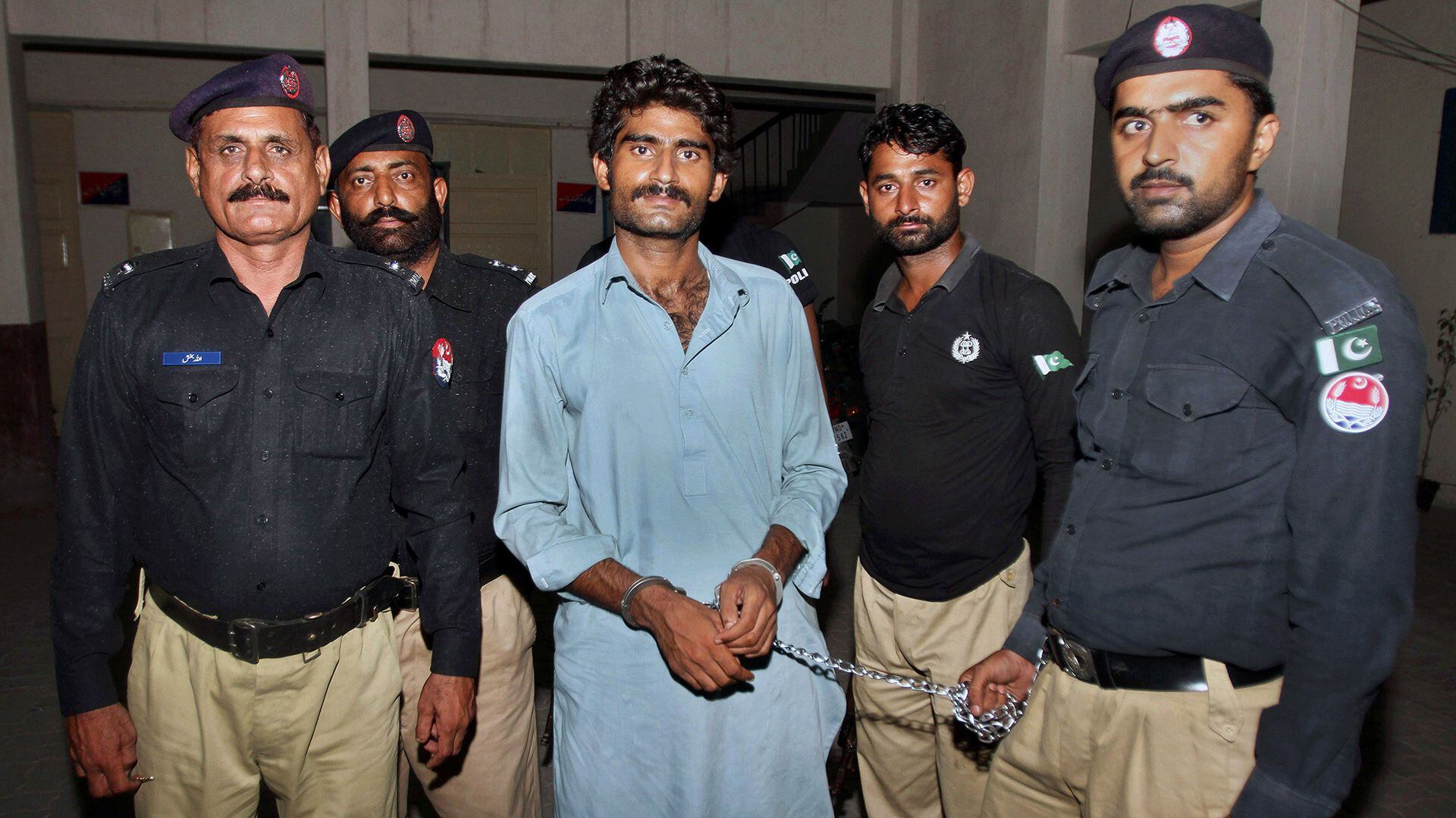 Waseem Azeem after his arrest.  (AP Photo/Asim Tanveer)