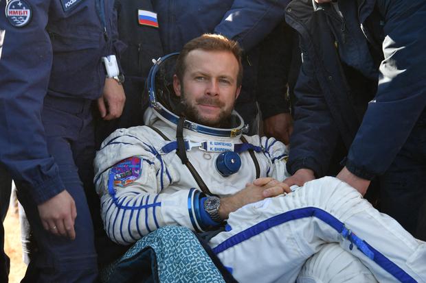 Russian film director Klim Shipenko, resting in a chair after the landing of the Russian Soyuz MS-18 space capsule.  (Photo: Handout / Russian Space Agency Roscosmos / AFP)