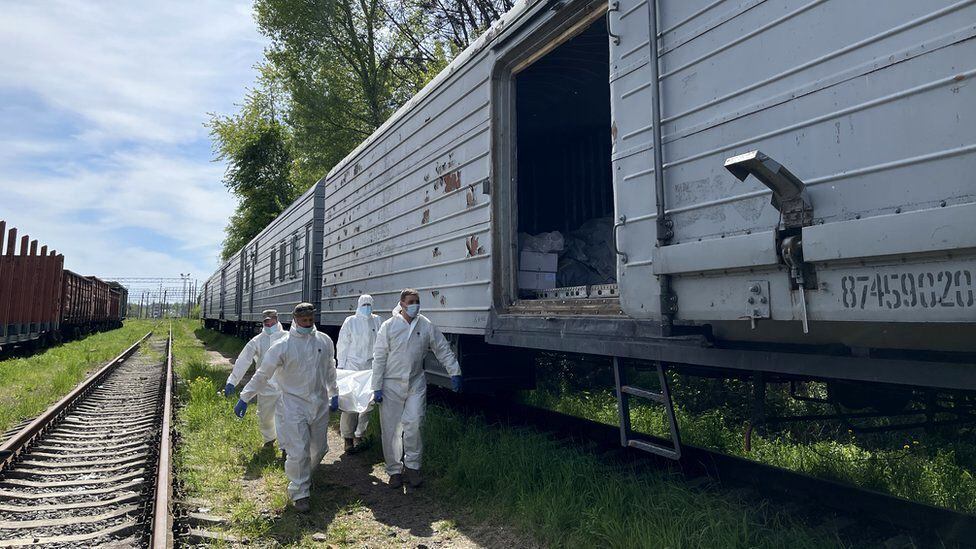 The bodies of dozens of Russian soldiers found near kyiv have been transferred to a refrigerated train.