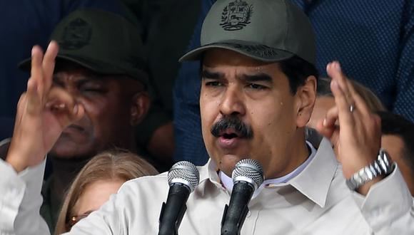 "Déjeme decirle, señor imperialista John Bolton, que sus sanciones nos dan mas fuerza", dijo Nicolás Maduro. (Foto: AFP)