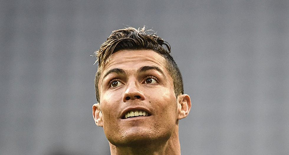 Cristiano Ronaldo fue homenajeado en el Real Madrid por su cifra en Champions League. (Foto: EFE)