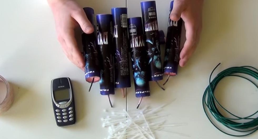 Quisieron probar la resistencia del Nokia 3310 y lo hicieron explotar con siete cartuchos de dinamita. El video es viral en YouTube. (Foto: Captura)
