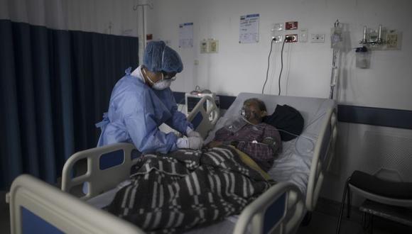 Coronavirus en Colombia | Últimas noticias | Último minuto: reporte de infectados y muertos por COVID-19 hoy, domingo 04 de julio del 2021. (Foto: AP/Ivan Valencia).