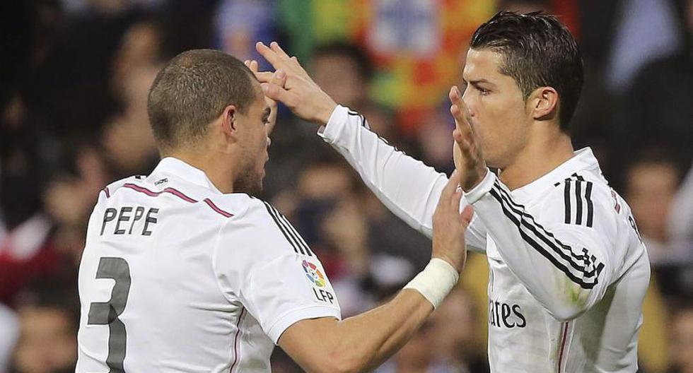 Cristiano Ronaldo y su compañero Kleper Laveran "Pepe". (Foto: EFE)