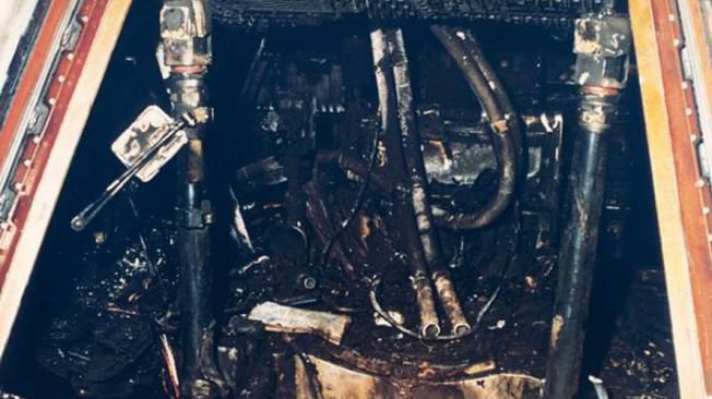 Interior of the capsule after the fire.  (Photo: NASA).