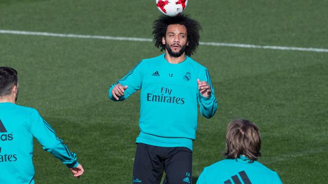 Marcelo también fue captado en el entrenamiento del Real Madrid. (Foto: AFP)
